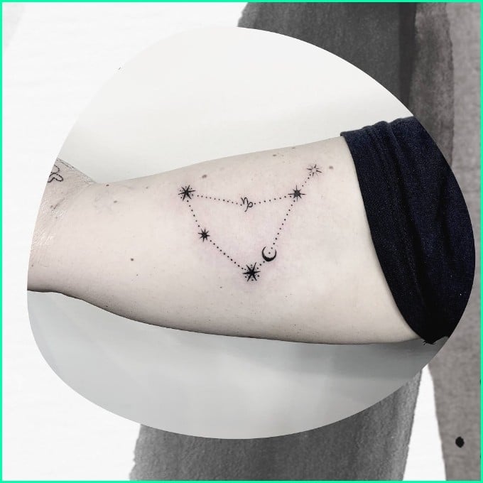 Capricorn star constellation tattoo on arm