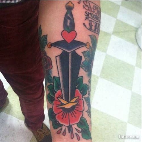 conor mcgregor tattoos arm's dagger tattoo