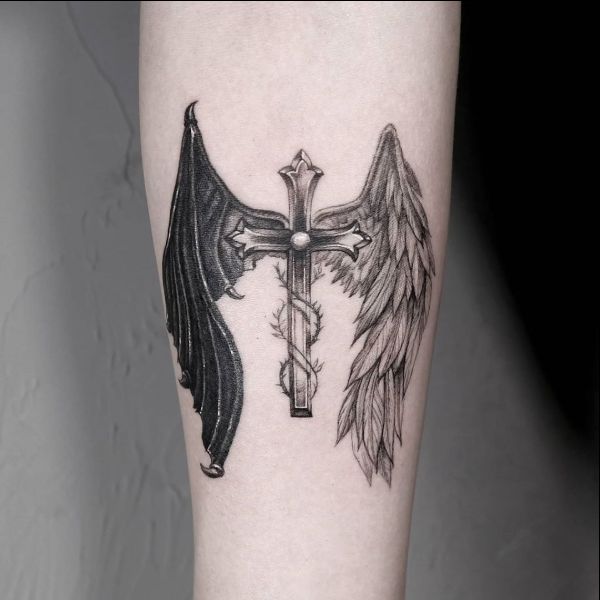 angel wings with cross tattoos