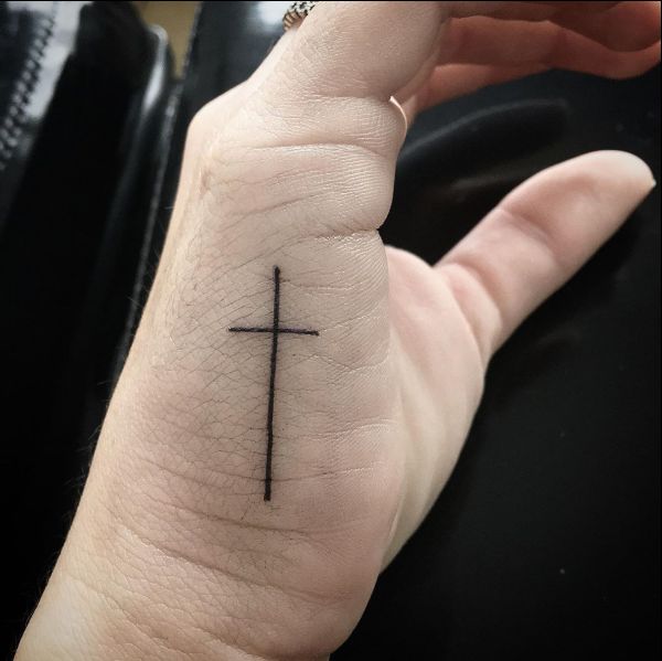 small cross tattoos on hands