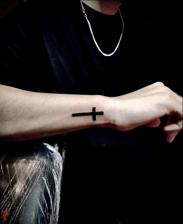 small cross tattoos on armTikTok Search