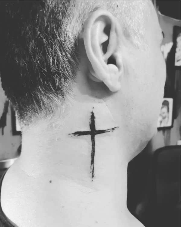 small cross tattoos over the neck