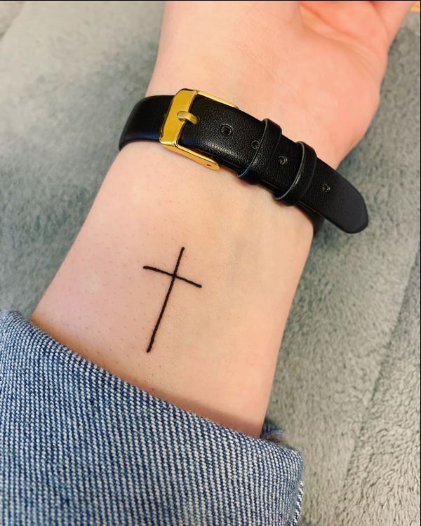 small cross tattoos on wrist
