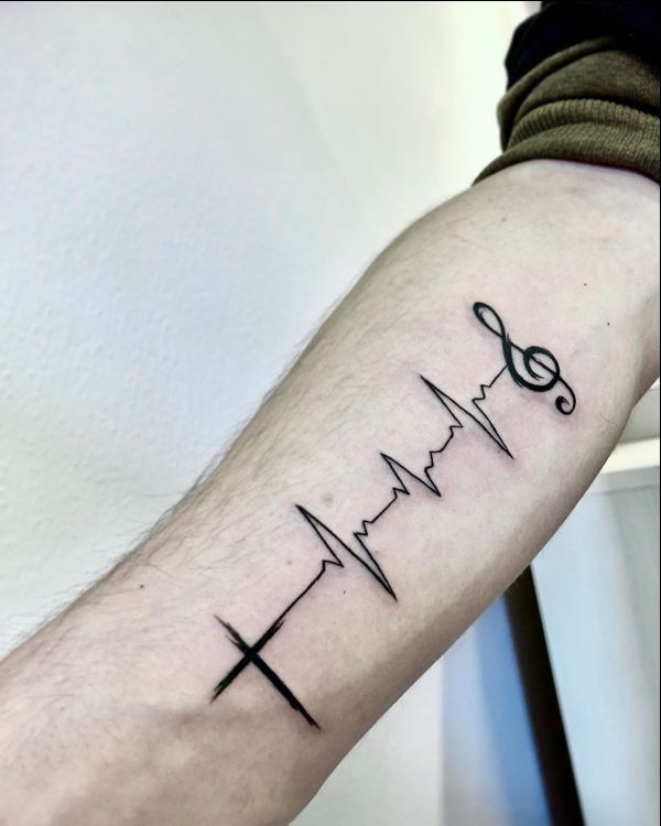 cross tattoo with music beats