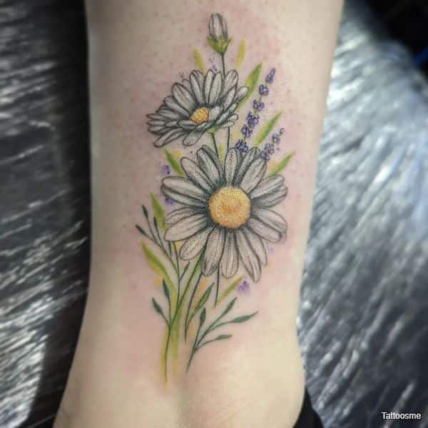 daisy tattoo on arms