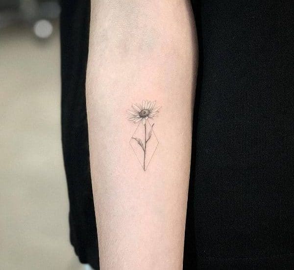 daisies tattoo on wrist