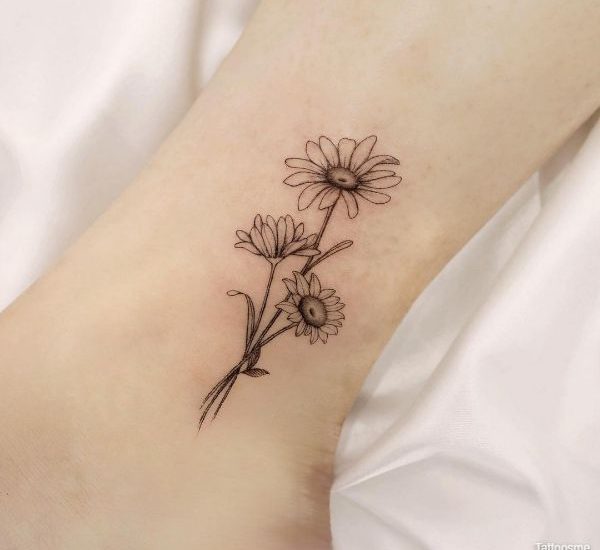 daisy tattoos on foot