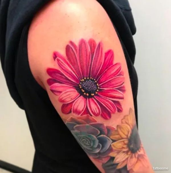 red color daisy tattoos 