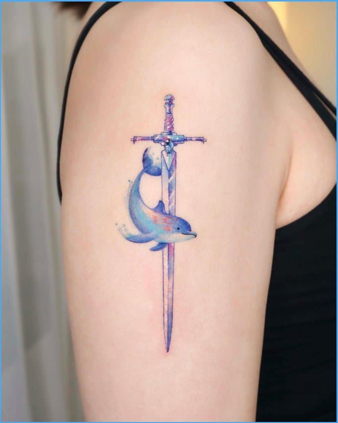 dolphin tattoos for upper arm with sword