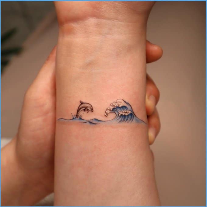 Best dolphin tattoos designs 32