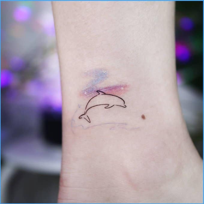 dolphin tattoos meaning
