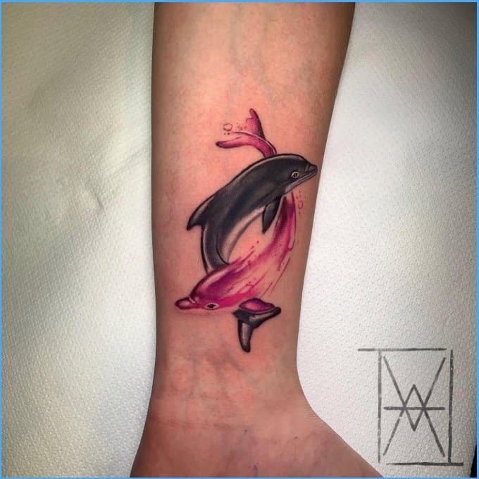 Matching dolphin tattoos by jizottt  Tattoogridnet