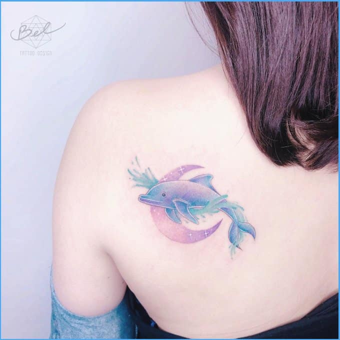 sunset dolphin tattoo with moon