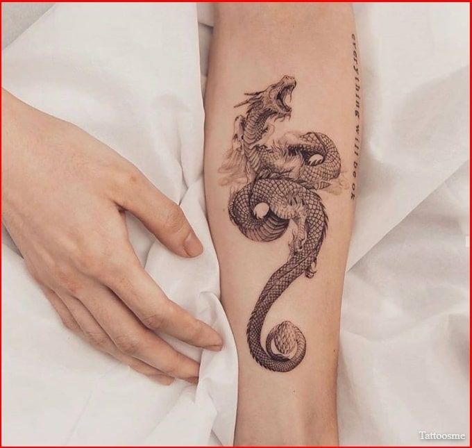 Dragon tattoos around the arm