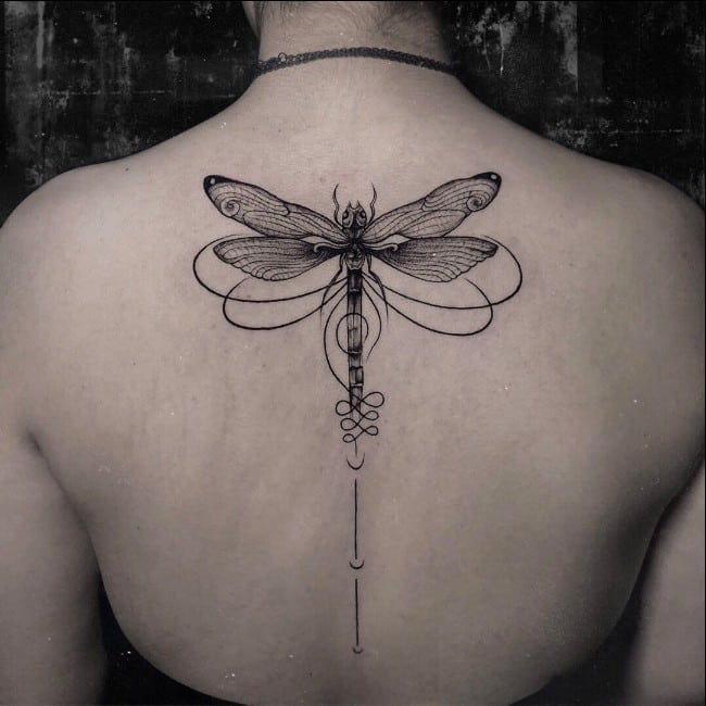 dragonfly tattoo on back