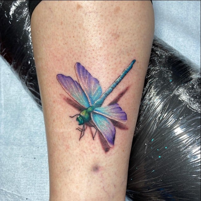 dragonfly tattoo leg