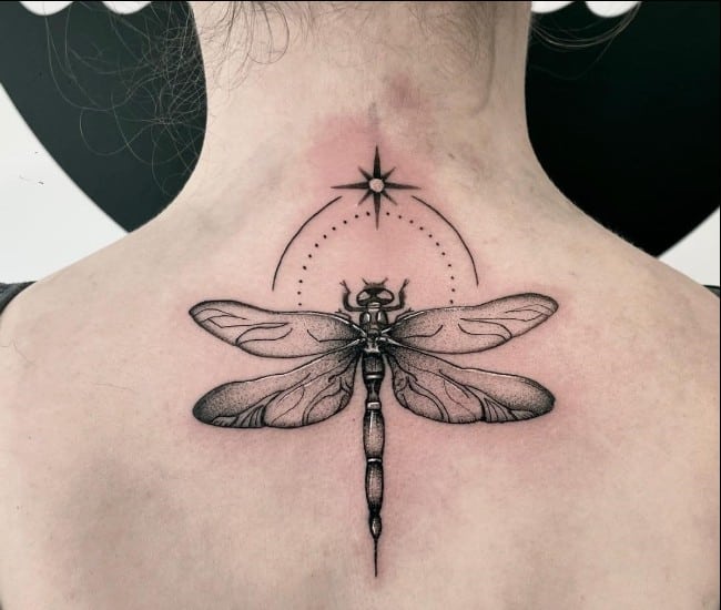 dragonfly tattoo back of neck