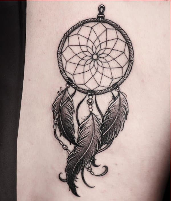 dreamcatcher tattoos on forearm