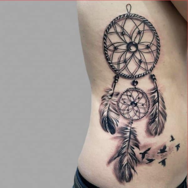 dream catcher tattoo rib cage