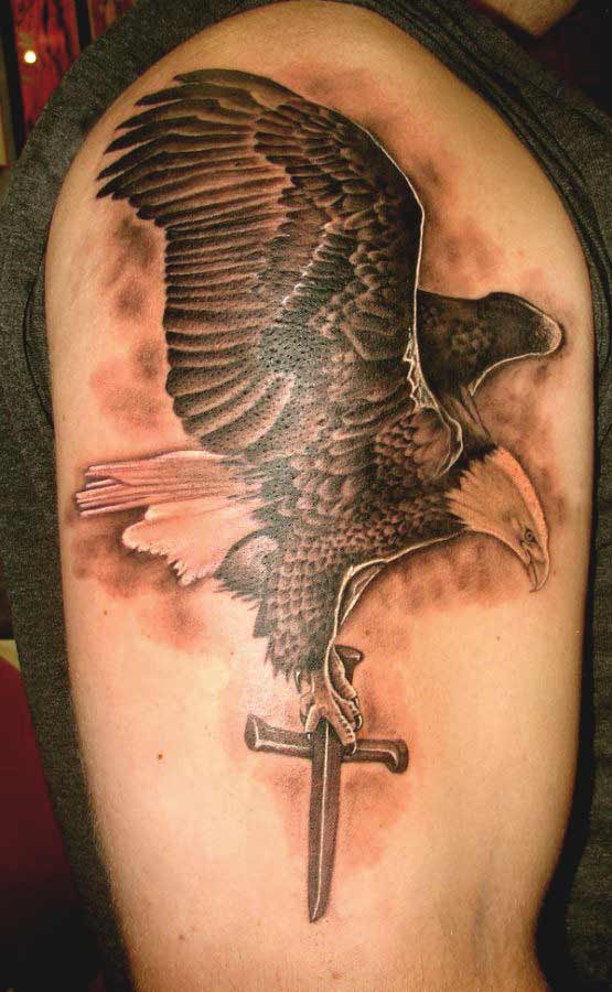 Eagle with cross tattoos designs