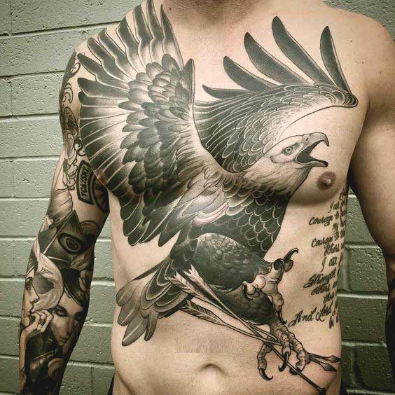 Eagle flying with arrow on chest tattoo