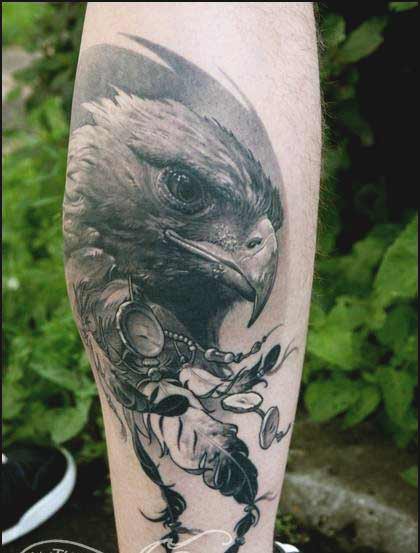 Eagle with feather tattoos designs on forearm ideas