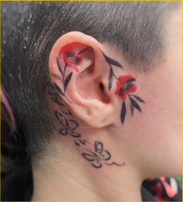 Delicate cherry blossom ear tattoo  Tattoos Tree of life tattoo Cherry  blossom tattoo