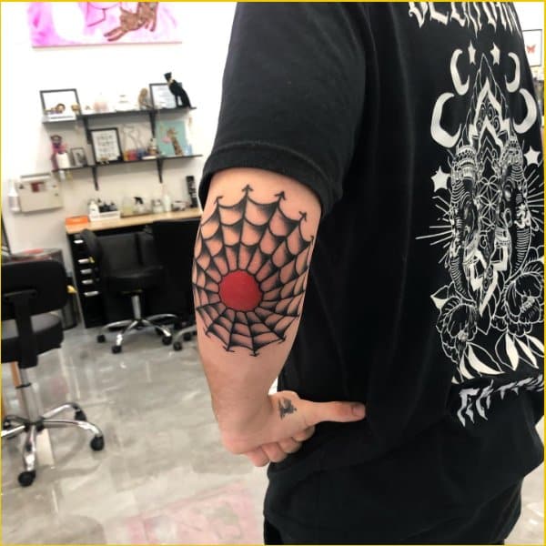 spider web tattoo on elbow