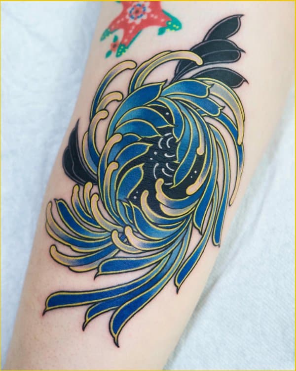 flower tattoo on elbow