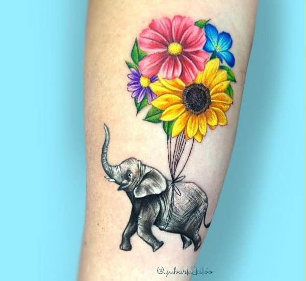 elephant tattoos with flowers