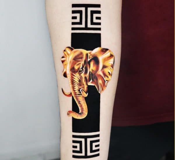 golden elephant tattoos