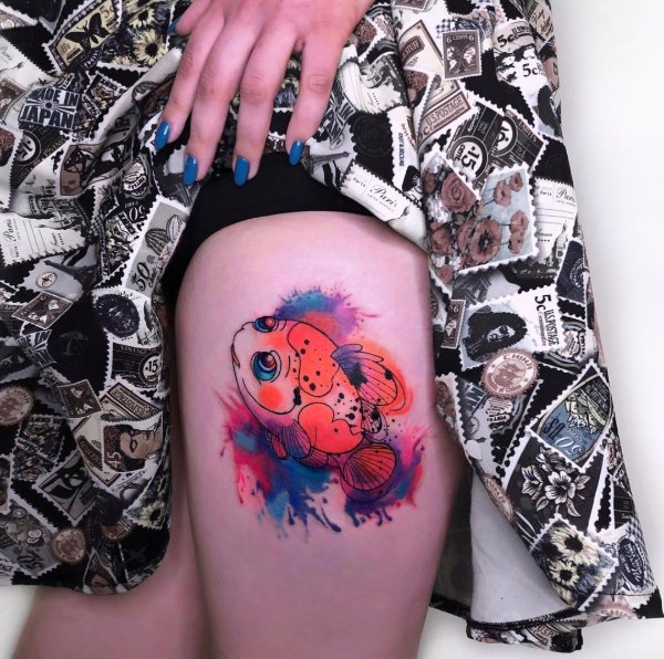fish tattoos on thigh