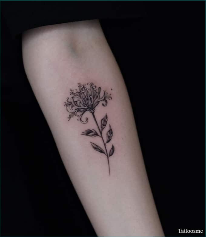 floral forearm tattoo