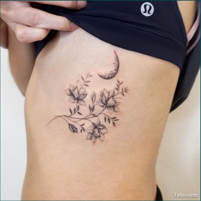 floral ribcage tattoo