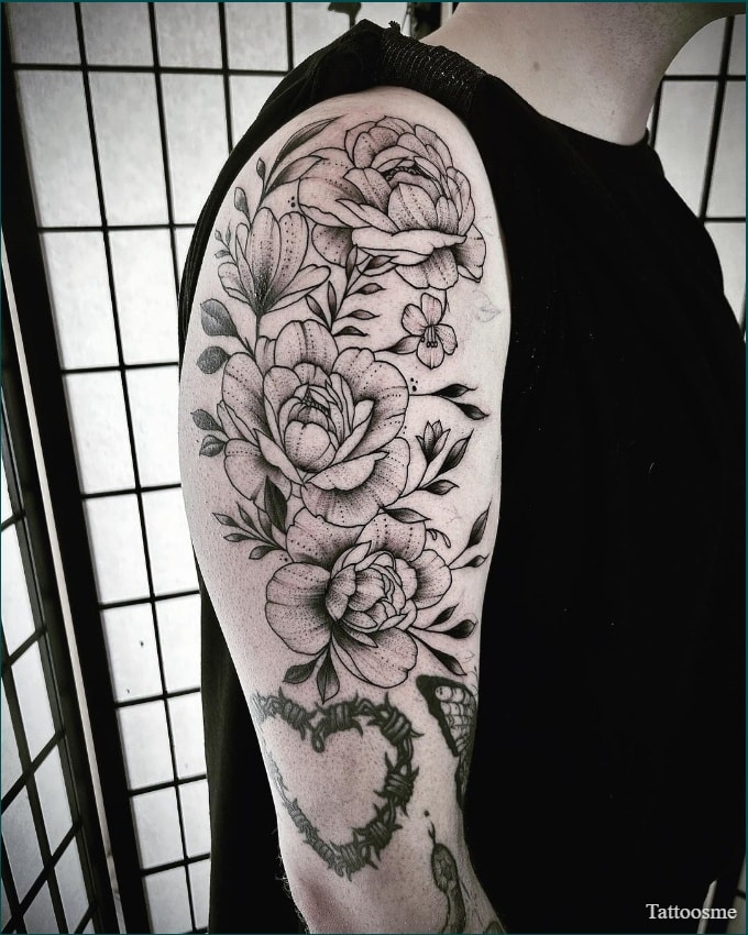 dainty floral cross tattoo