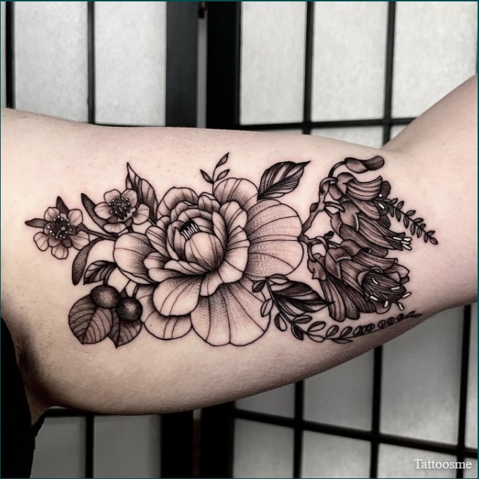 Black floral pieces on the arm  Tattoogridnet