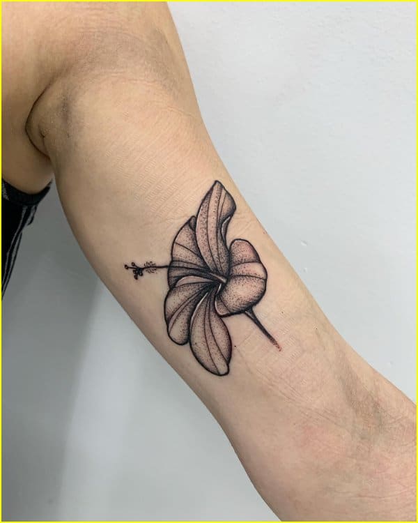 Hibiscus flower tattoo inner bicep