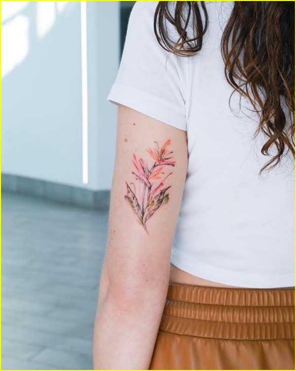 flower tattoos color back of arm