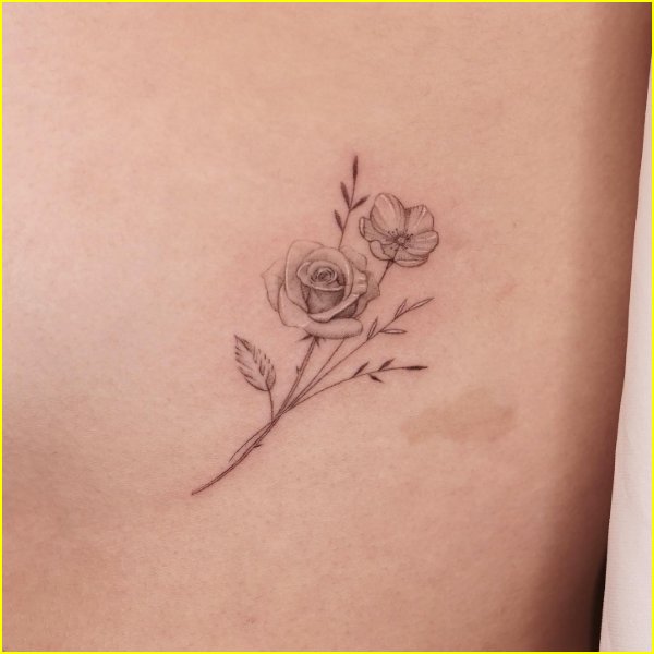small rose flower tattoo