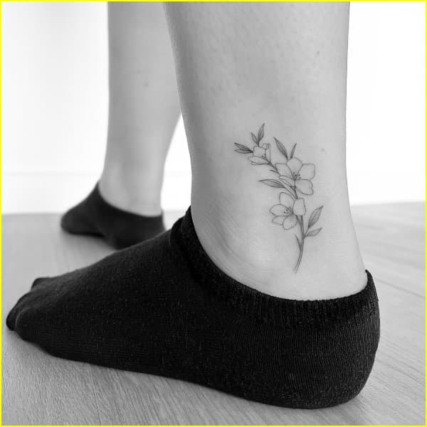flower ankle tattoos