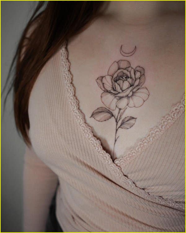 flower tattoo on chest for girls