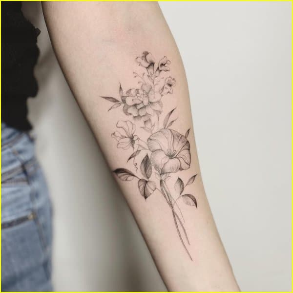 hibiscus flower tattoo on arm