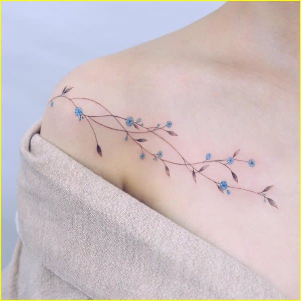 flower tattoo collarbone