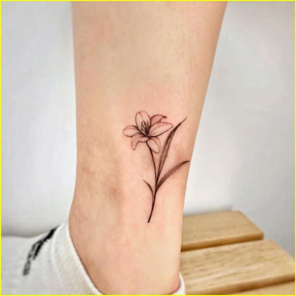 lilly flower on ankle tattoos