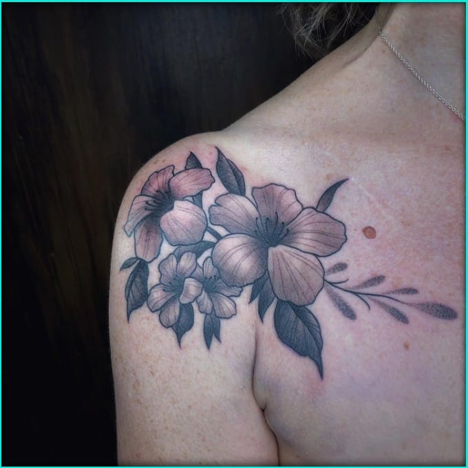 hawaiian sleeve tattoo on shoulder