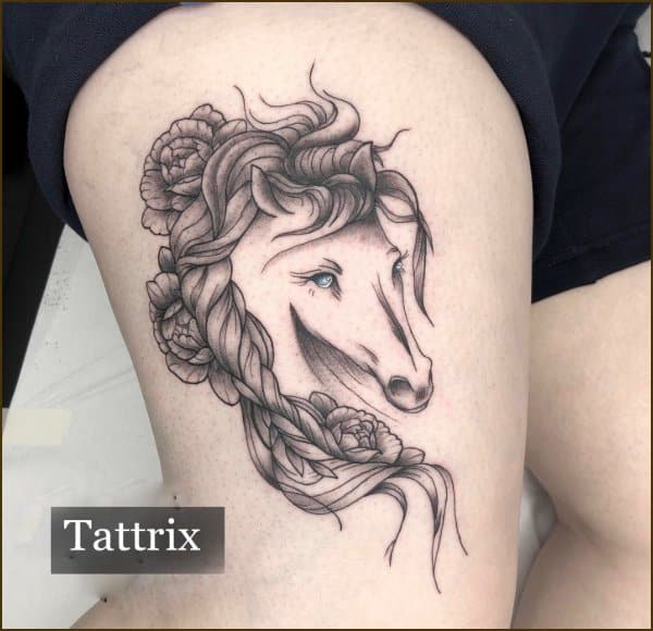 female horse tattoo on thigh