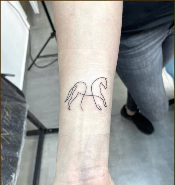 horse tattoo outline on wrist