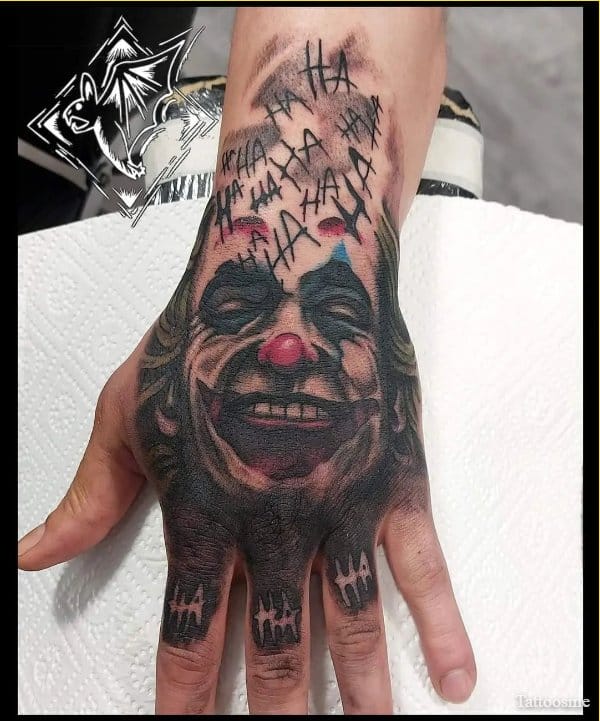 joker tattoo on hands