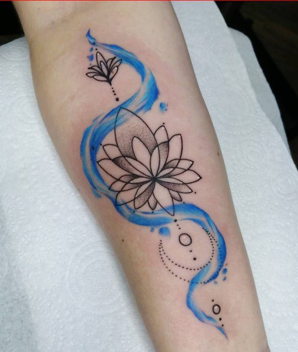 Lotus flower tattoo with blue color