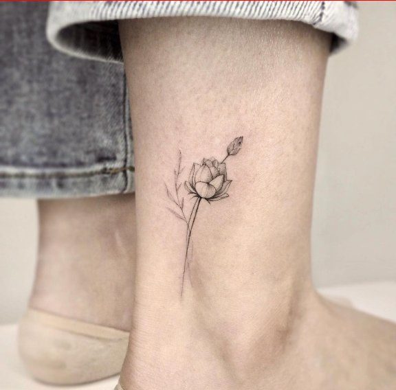 Lotus tattoo design on ankle